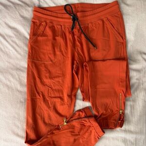 Zyia Peak Zipper jogger in orange
